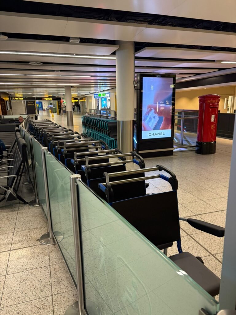 Empty airport terminal with advertising display.