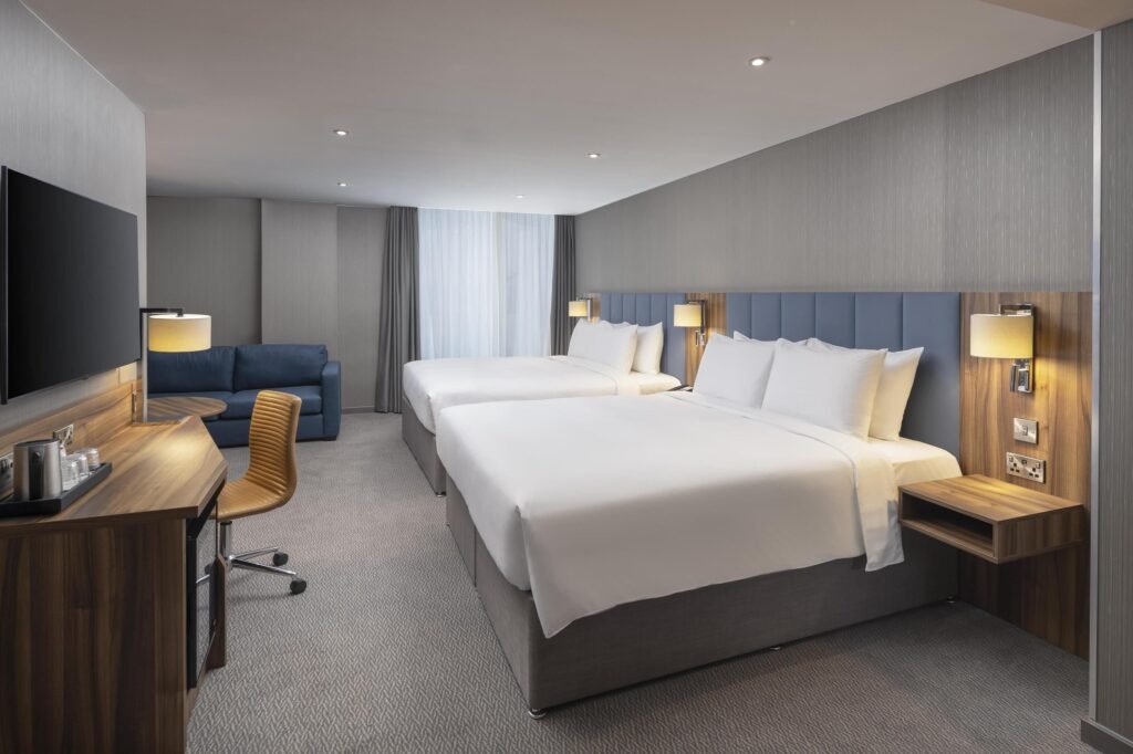 Modern hotel room with two beds in Hilton Garden Heatrow airport
