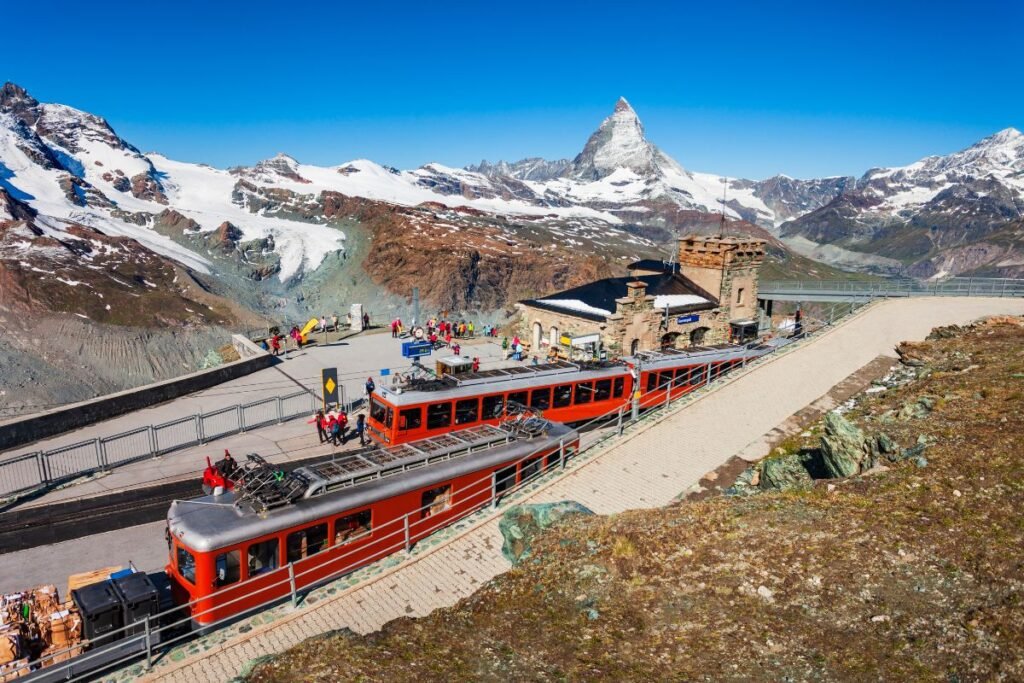 Mountain train station with stunning views aroun Swiss Alpes