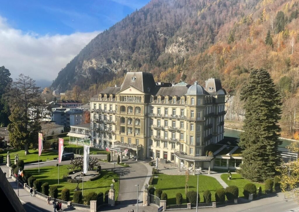 Historic hotel surrounded by mountains