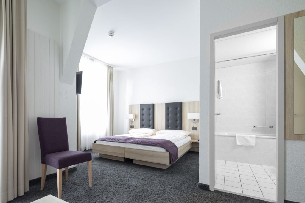 Modern hotel room with double bed