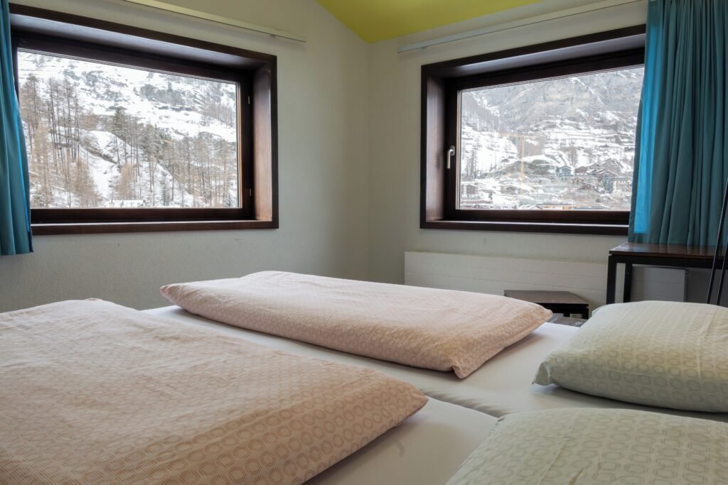 Cozy bedroom with mountain views.