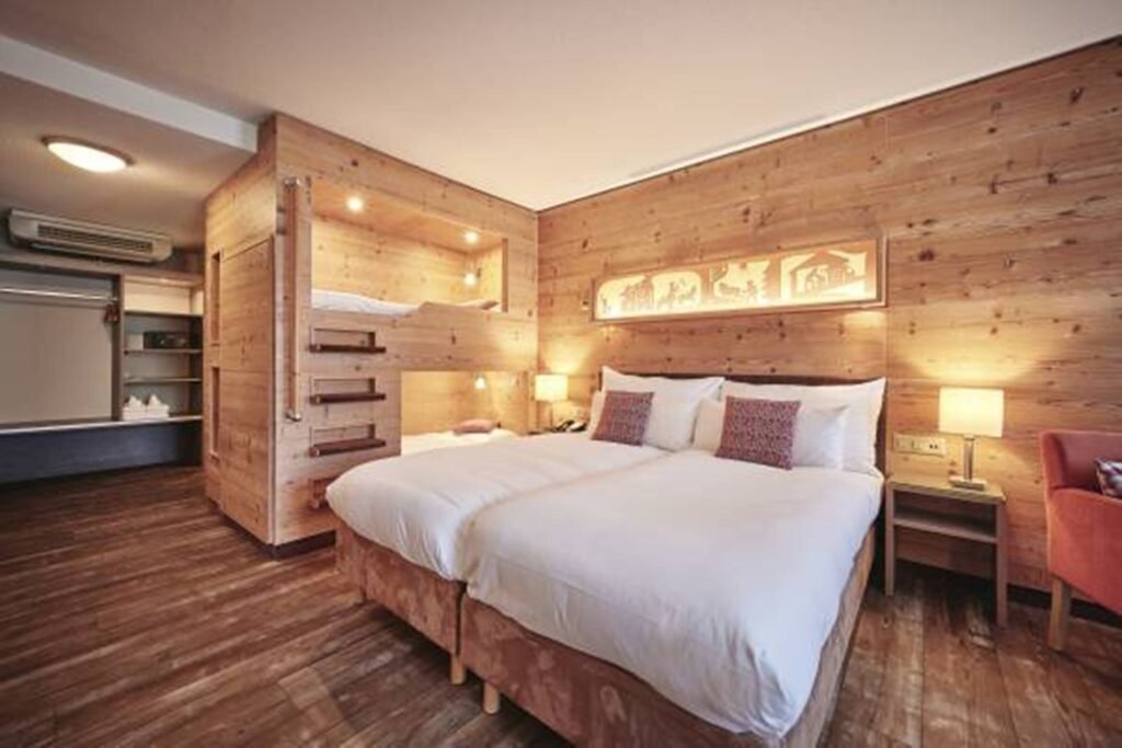 Cozy wooden hotel room with bunks