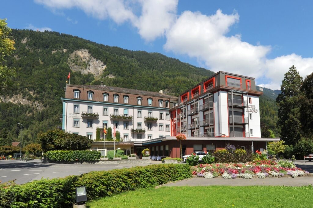 Hotel building surrounded by mountains