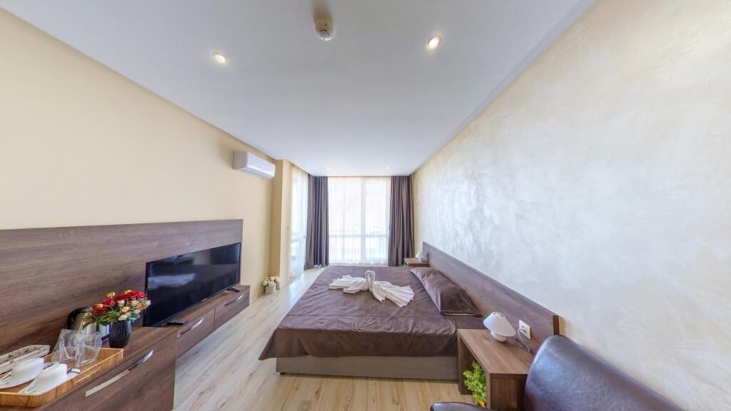 Paradiso Aparthotel studio apartment interior Sunny Beach Bulgaria modern room