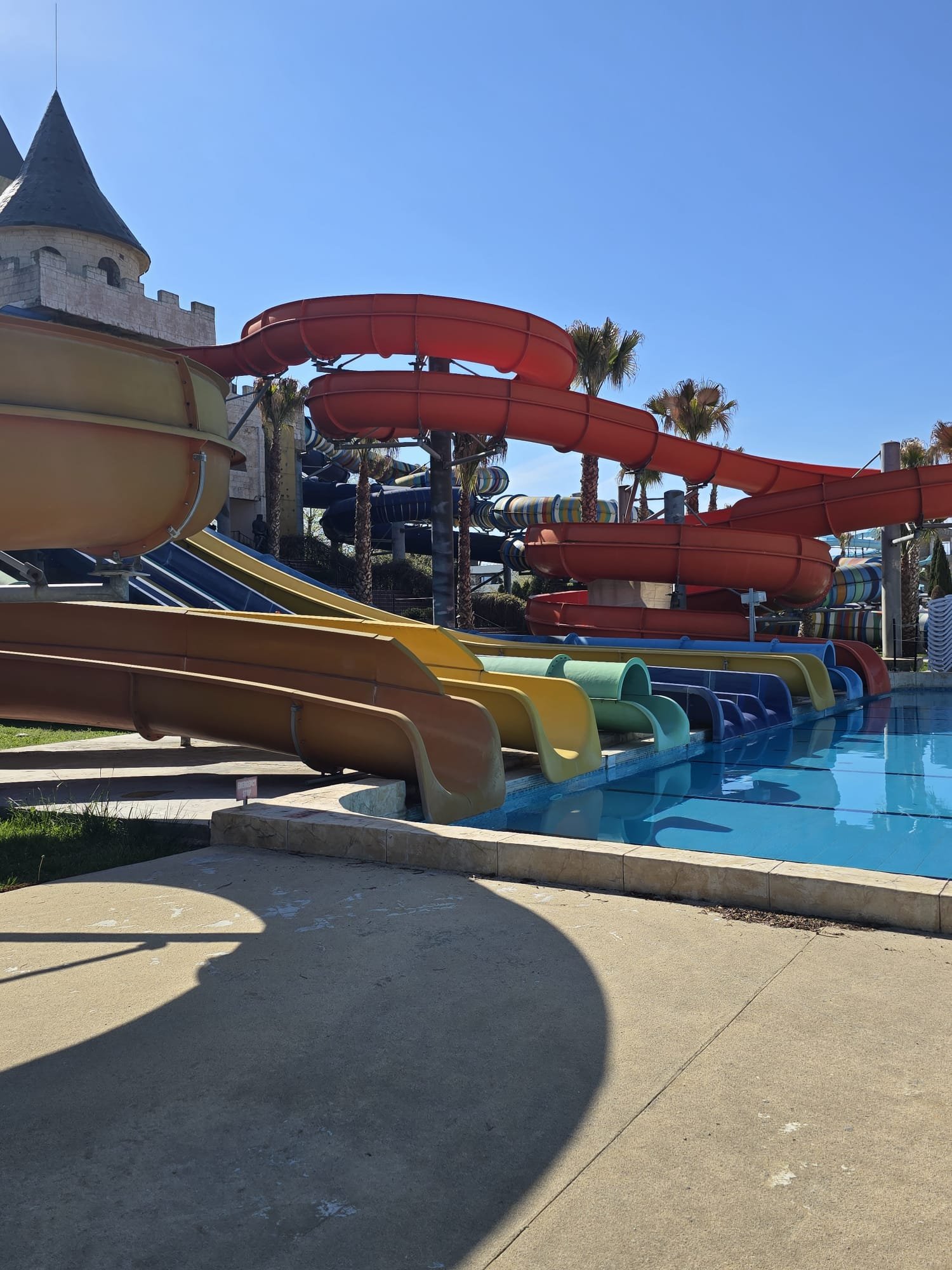 Colourful water slides by swimming pool in Aquapark Nesebar Bulgaria
