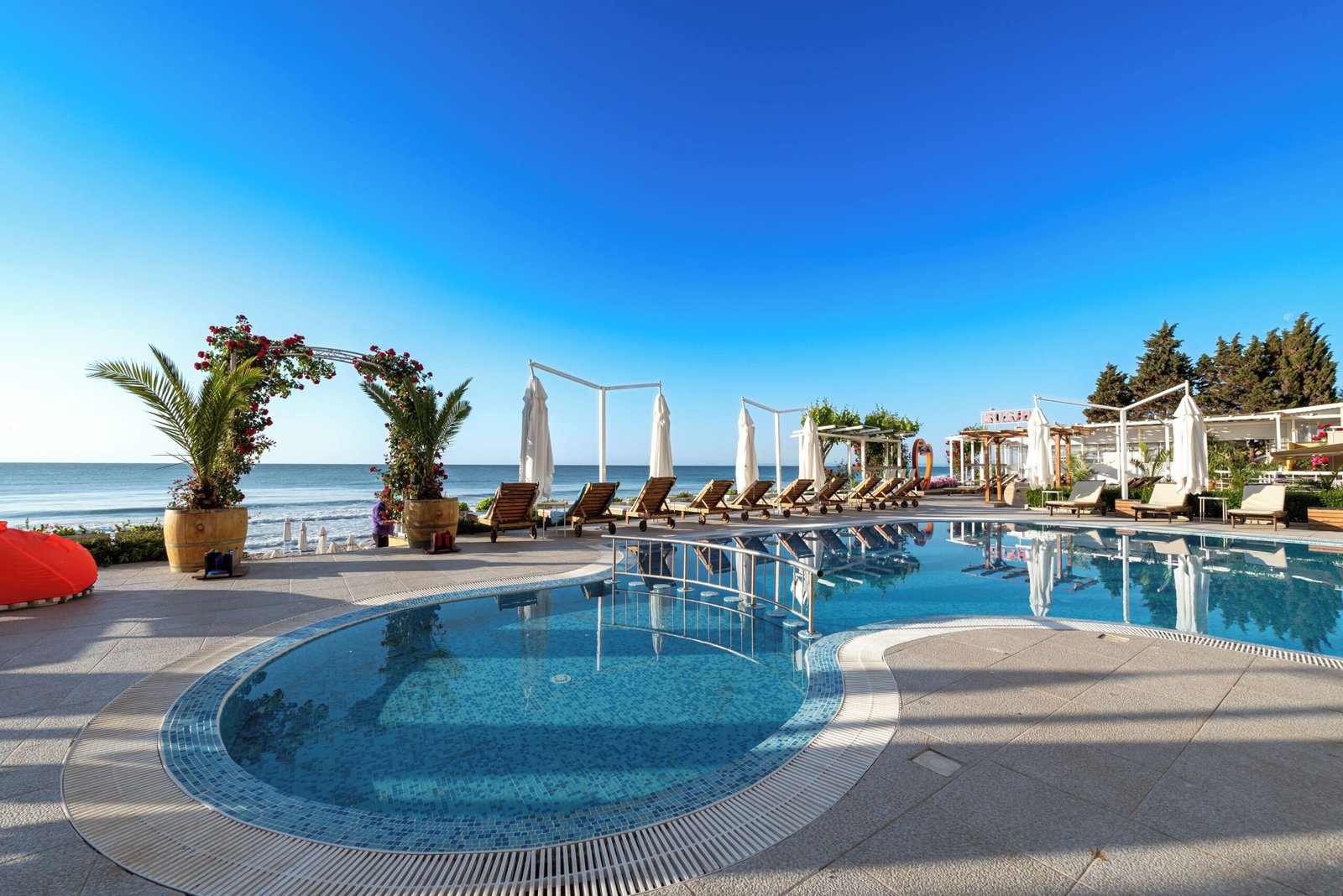 Serene poolside by the beach in Agya Napa