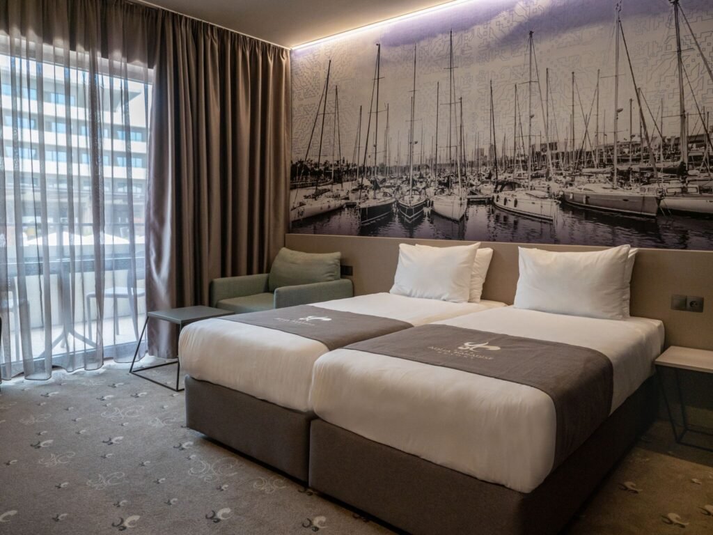 Aqua Paradise Resort Ravda modern hotel room with double bed and balcony view